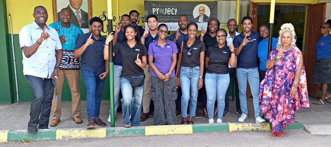 Members of Fast Enterprises, the Pollyanna Project Inc, and Old Harbour High smile for the cameras after a successful presentation. 
