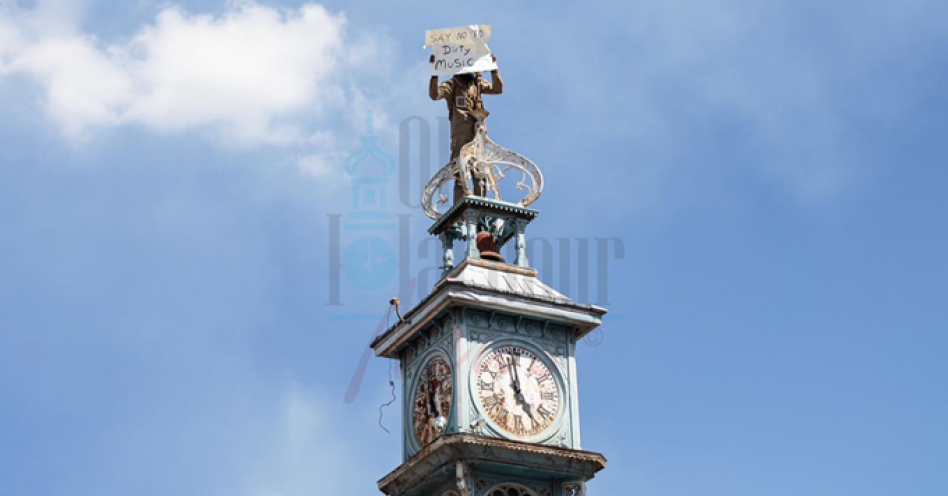 Dancehall artiste Hunguhpengeh atop the Old Harbour Clock on March 5, 2024. (OH New Photo)