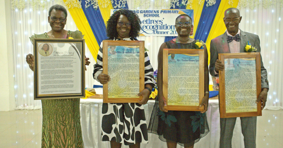L-R: Diana Bryan-Salmon, Olive Bromfield-Jackson, Pauline Humes-Letts, and Wilfred Wilson, shared lens time with their framed citation at the Spring Gardens Primary Retirees’ Recognition Dinner inside the banquet hall of the Church of God of Prophecy, Old Harbour on May 1, 2025. (Photo: Dandre McKenzie)
