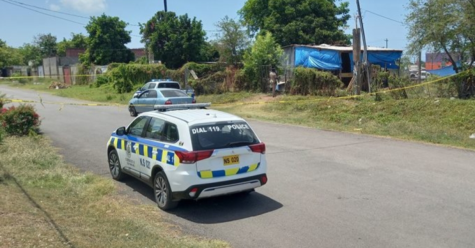 Police cordon off the crime scene at this makeshift woodwork shop at Marlie Mount. (OH News Photo)